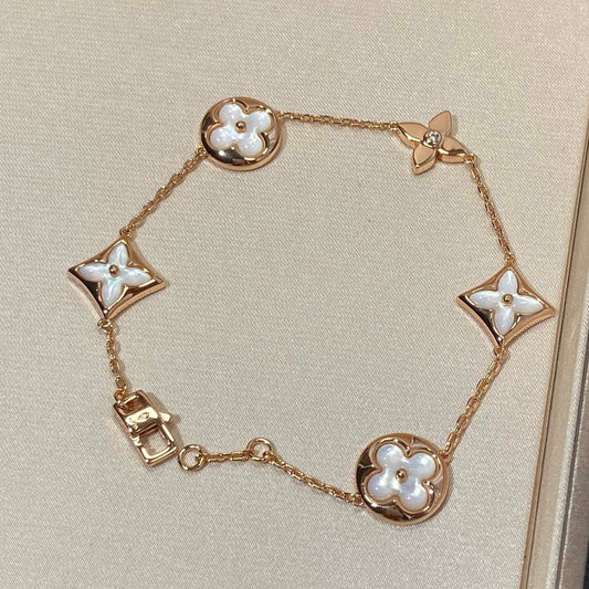 [Radiant Gem]¯STAR AND SUN 5 MOTIF MOP PINK GOLD BRACELET