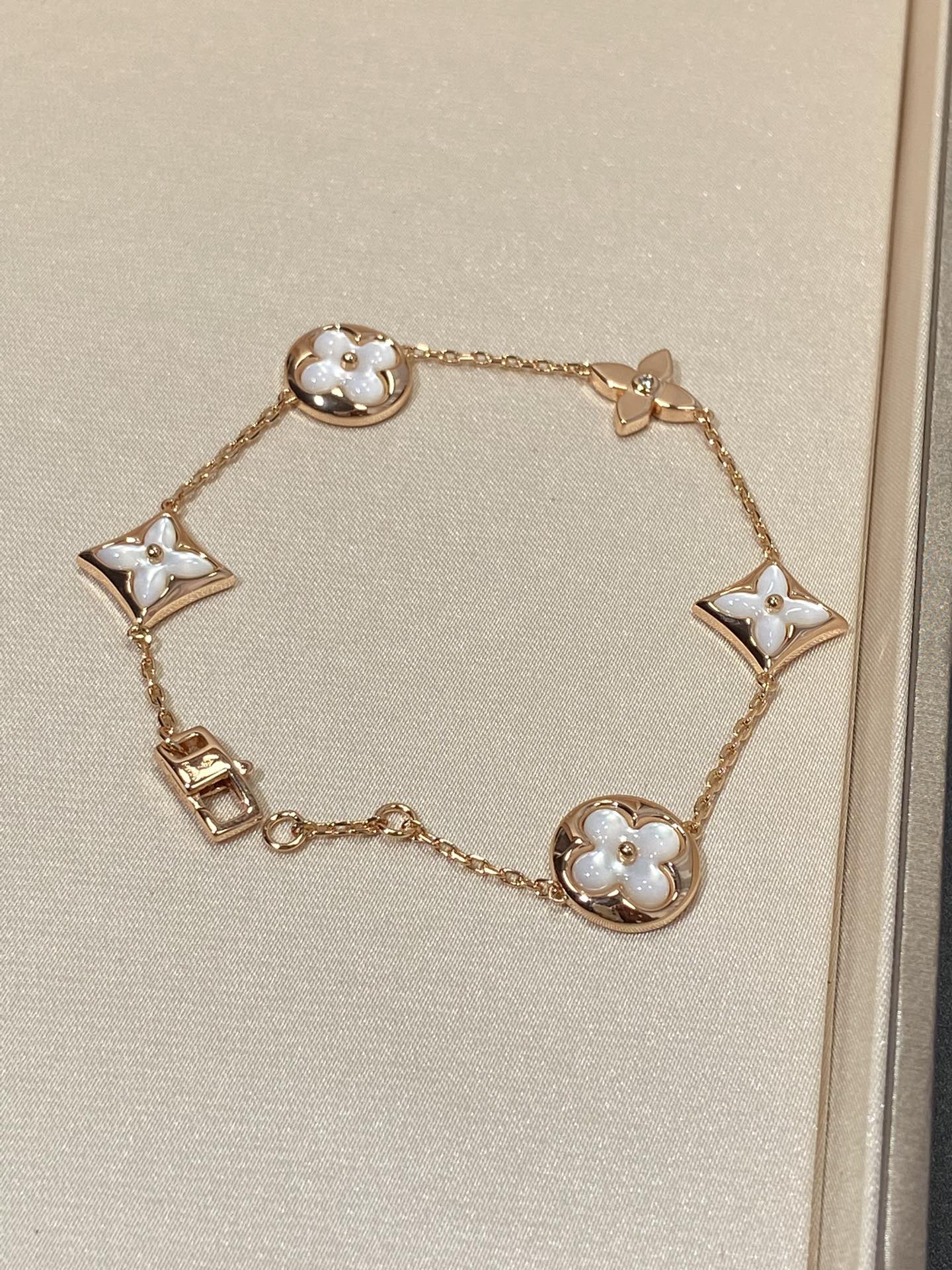 [Radiant Gem]¯STAR AND SUN 5 MOTIF MOP PINK GOLD BRACELET