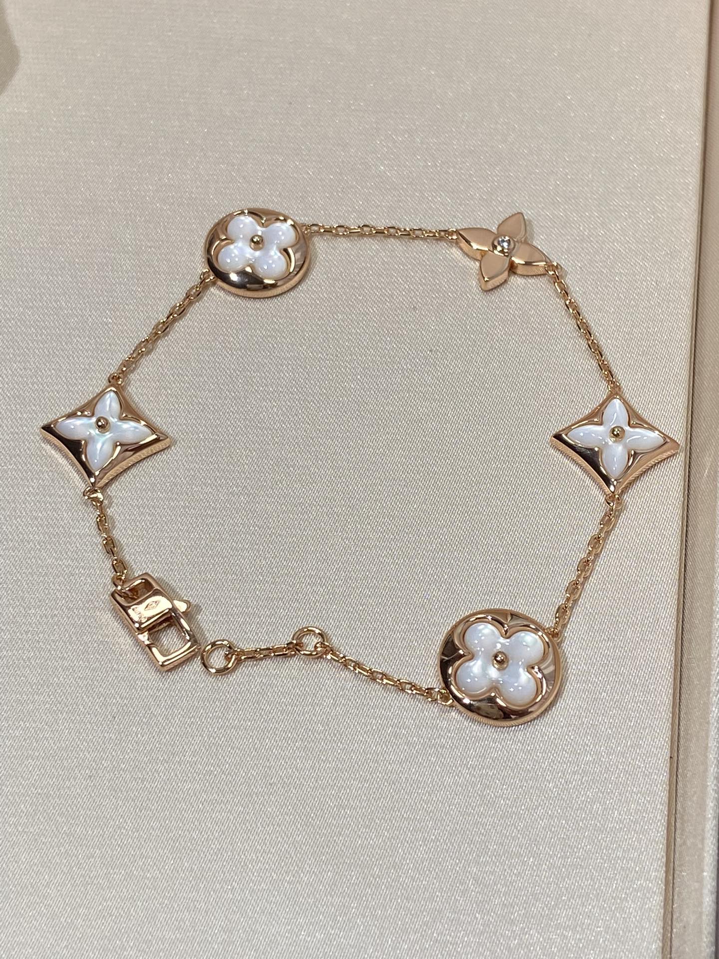 [Radiant Gem]¯STAR AND SUN 5 MOTIF MOP PINK GOLD BRACELET