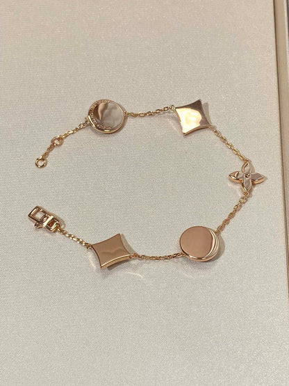 [Radiant Gem]¯STAR AND SUN 5 MOTIF MOP PINK GOLD BRACELET