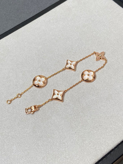 [Radiant Gem]¯STAR AND SUN 5 MOTIF MOP PINK GOLD BRACELET