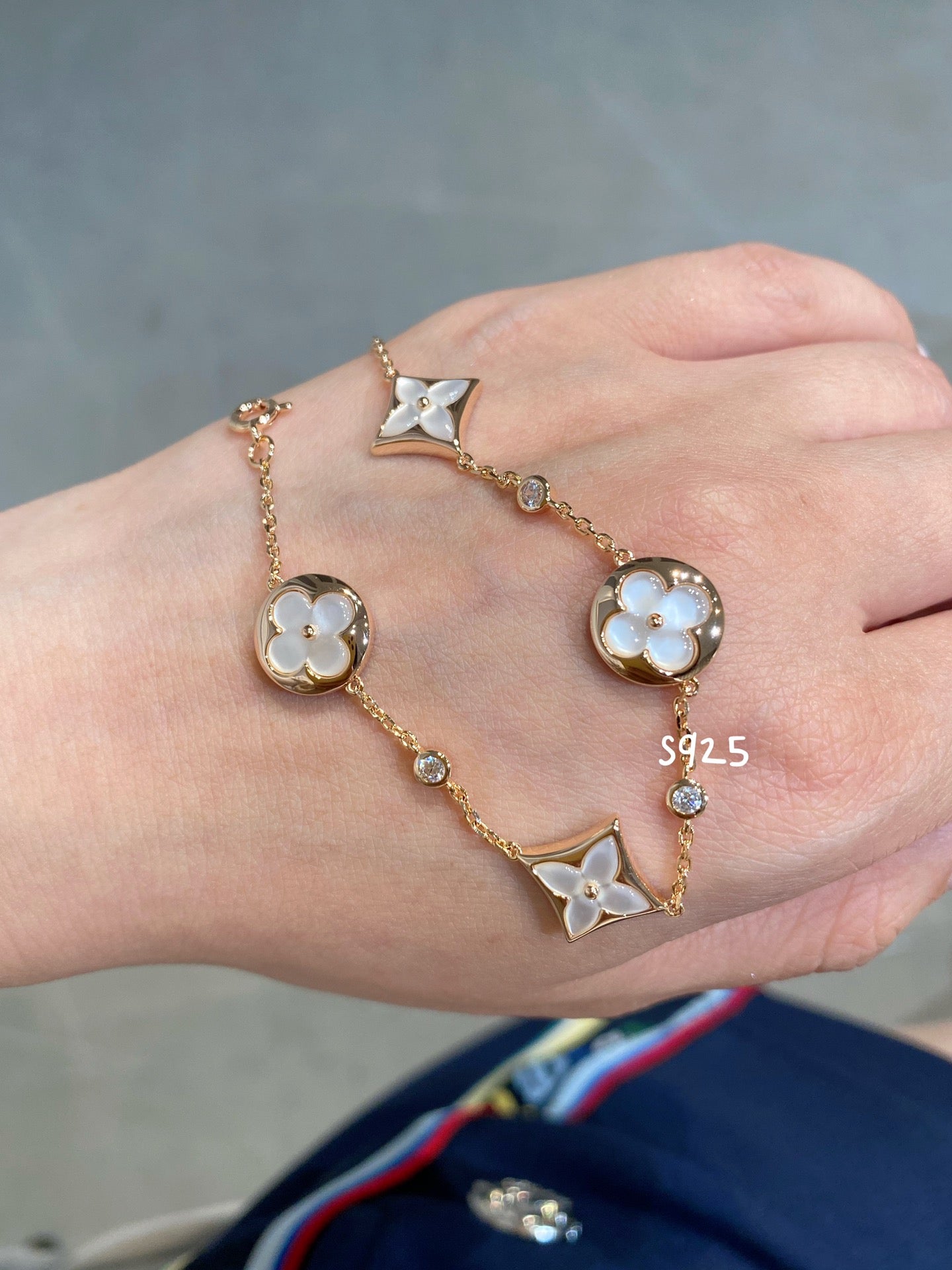 [Radiant Gem]¯STAR AND SUN 4 MOTIF WHITE MOP PINK GOLD BRACELET
