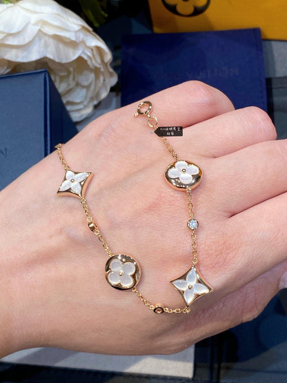 [Radiant Gem]¯STAR AND SUN 4 MOTIF WHITE MOP PINK GOLD BRACELET